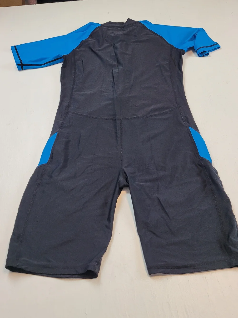 Black and Bright Blue Short Sleeve Swim Suit with Front Zip